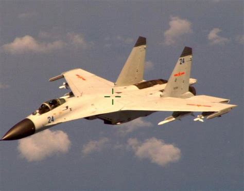 中国战机拦截美军侦察机解说