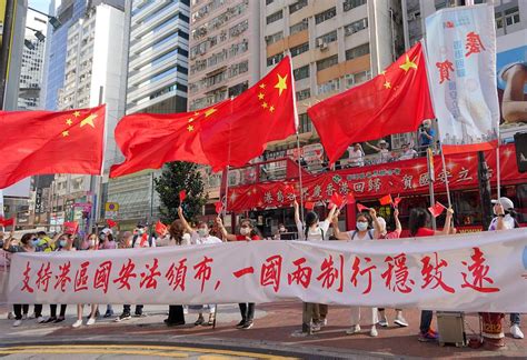 促进香港澳门长期繁荣稳定完成祖国统一大业