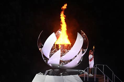 历届奥运会圣火点燃的方式