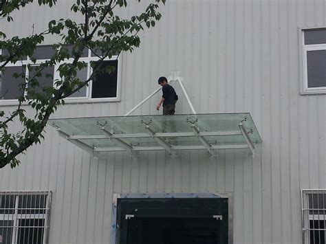自贡安装玻璃雨棚钢结构